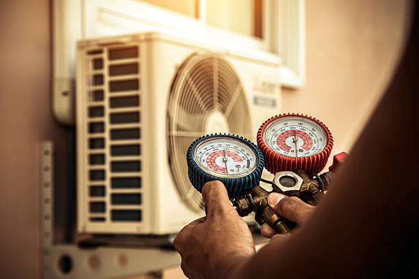 Professional Air Conditioning Service technician working in Hayti, PA